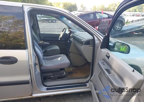 2004 Ford Freestar S из США, поврежденный, VIN 2FMZA50694BA05591